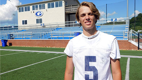 Human juggles golf and football at Grace Christian