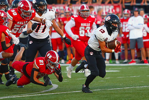 Powell streaks past Red Devils, 33-3