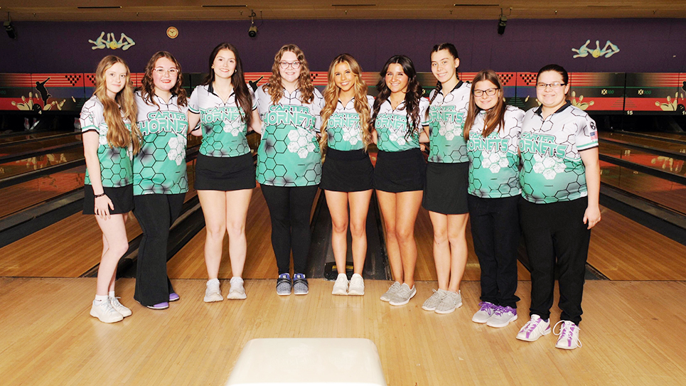 Carter sweeps titles again