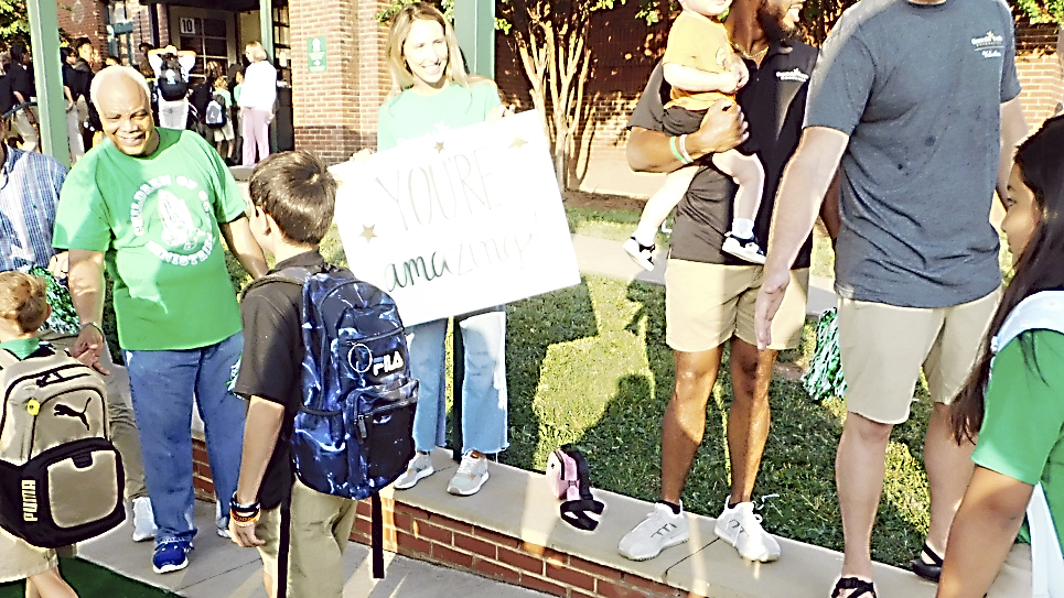 Emerald Academy students walk the green carpet on first day of new academic year